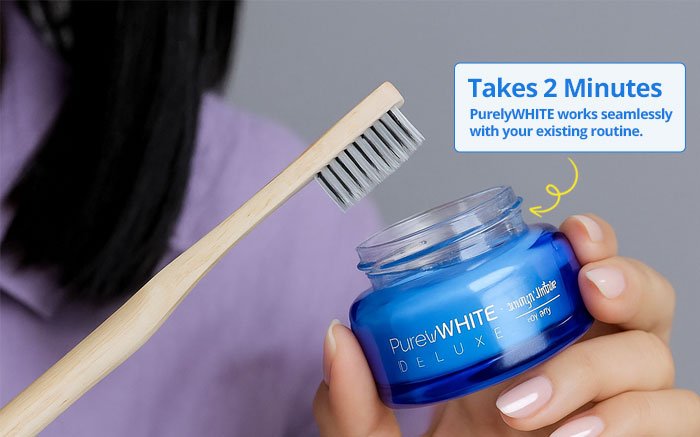 Toothbrush dipping into the PurelyWHITE jar, takes 2 minutes and works with an existing brushing routine