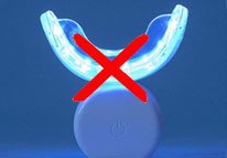 LED whitening mouthpiece crossed out, indicating no device is needed